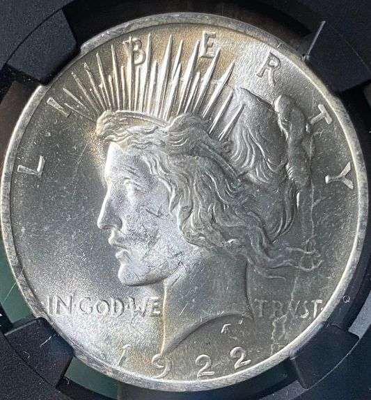 1922 NGC Brilliant Uncirculated Peace $ With Original Bag Fragment