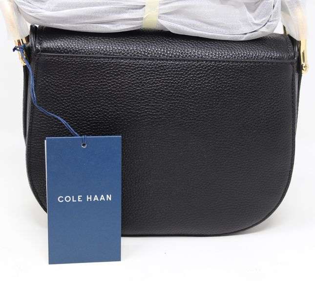 Brand new Cole Haan black leather saddle bag