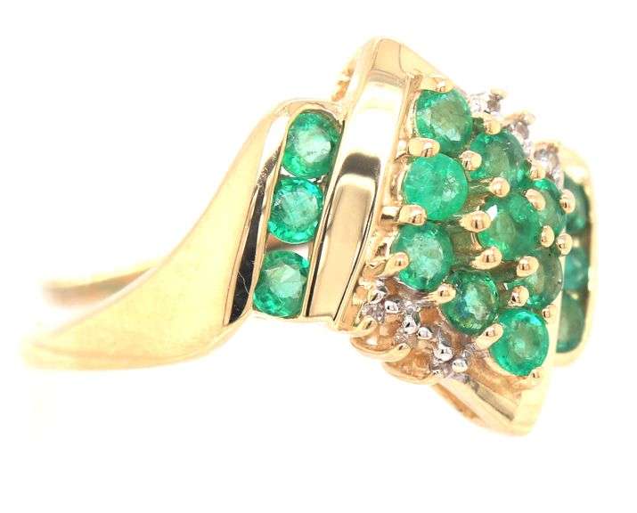 14kt Yellow gold emerald and diamond accent cluster ring