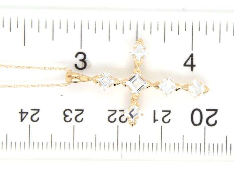 14kt Yellow gold aquamarine cross pendant on chain