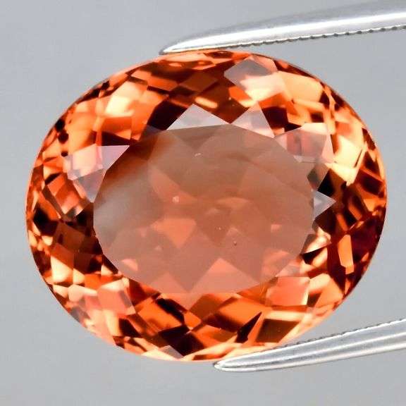 Substantial heavy flashing 12.11ct Brazilian imperial Topaz