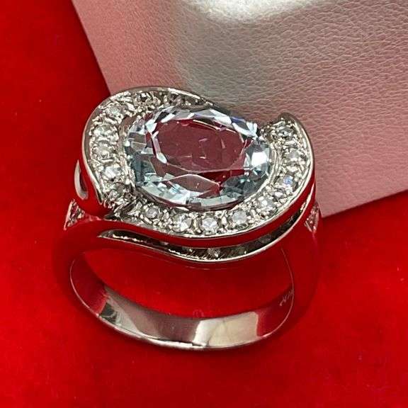 CERTIFIED 14K WHITE GOLD AQUAMARINE AND DIAMOND RING.
