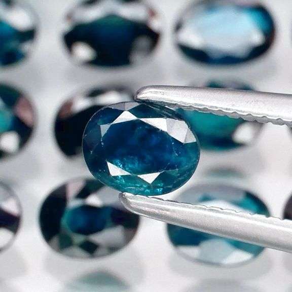 Stunning heated only 7.55ct dark blue Sapphire set