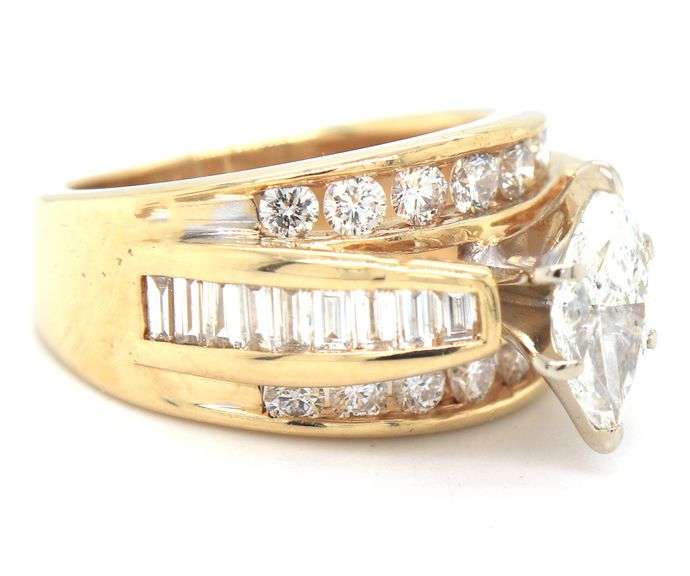 14kt Yellow gold marquise and baguette and RBC channel set engagement ring