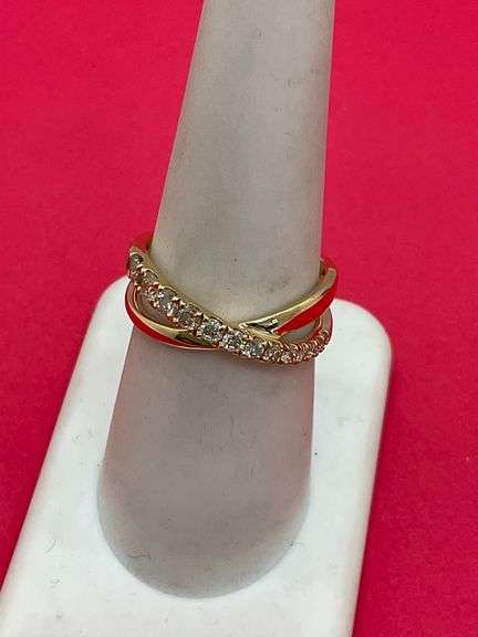 LADIES BRAND 14K YELLOW GOLD DIAMOND CROSSOVER RING.