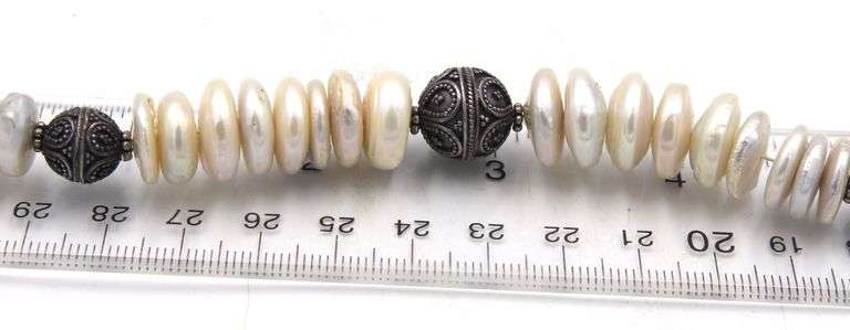 Pearl beaded disc bracelet in costume jewelry