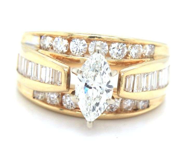 14kt Yellow gold marquise and baguette and RBC channel set engagement ring