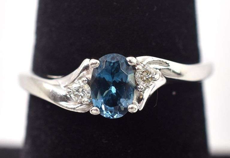 Elegant 10K White Gold Blue Topaz and Diamond Ring