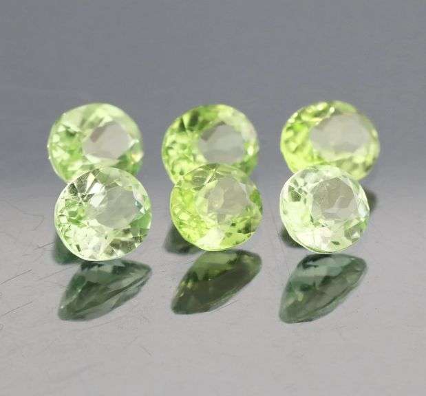 Gorgeous 6.73ct untreated green Peridot set