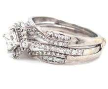 14kt White gold 0.60ctw princess cut diamond engagement ring with diamond wrap