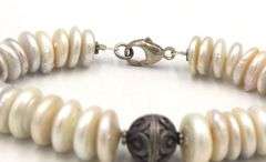 Pearl beaded disc bracelet in costume jewelry