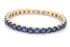 14kt Yellow gold blue sapphire eternity band