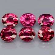 Remarkable 4.48ct violet pink Rhodolite Garnet set