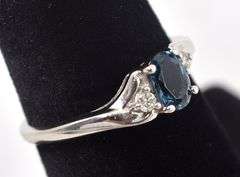 Elegant 10K White Gold Blue Topaz and Diamond Ring