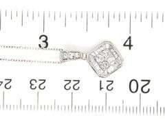 14kt White gold baguette and round diamond pendant on chain necklace