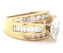 14kt Yellow gold marquise and baguette and RBC channel set engagement ring