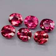 Remarkable 4.48ct violet pink Rhodolite Garnet set