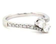14kt White gold 0.75ctw bypass 2 diamond ring