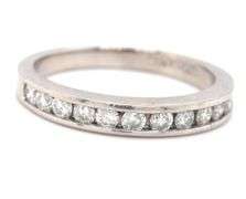 14kt White gold Channel set diamond band