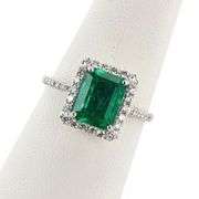 PLATINUM EMERALD AND DIAMOND RING 3.02 C.T.W.