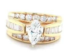 14kt Yellow gold marquise and baguette and RBC channel set engagement ring