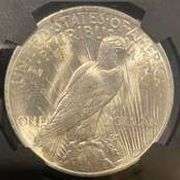 1922 NGC Brilliant Uncirculated Peace $ With Original Bag Fragment