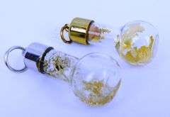 2 Vintage Floating Silver & Gold Bottle Pendants