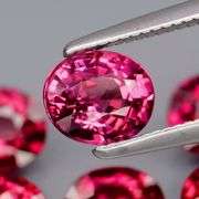 Remarkable 4.48ct violet pink Rhodolite Garnet set