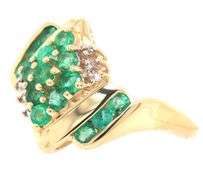 14kt Yellow gold emerald and diamond accent cluster ring