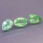 Tremendous 2.91ct untreated spring green Tsavorite set