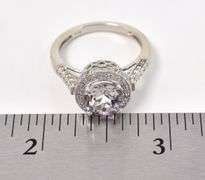 Sparkling 14K white Gold Purplish Gemstone and Diamond Ring