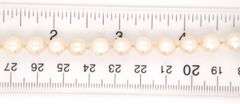 Pearl necklace with 14kt White gold diamond clasp