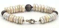 Pearl beaded disc bracelet in costume jewelry