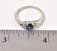 Elegant 10K White Gold Blue Topaz and Diamond Ring