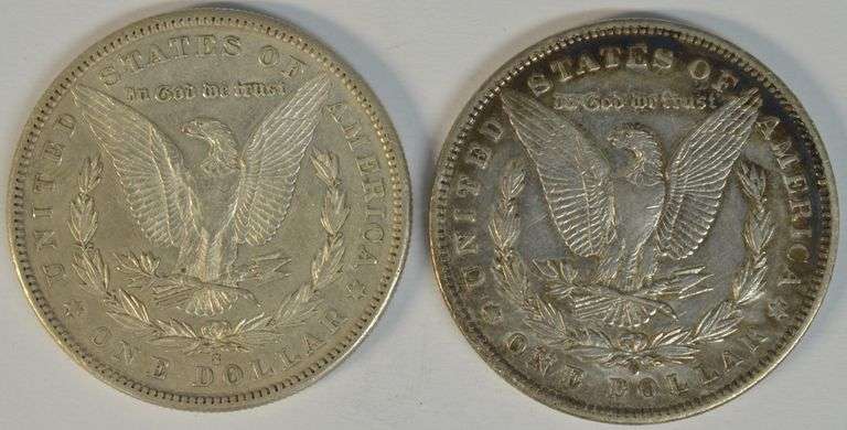 Scarce pair of Morgan Silver Dollars from 1883-S & 1886-O. AU