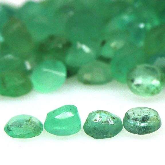 Round cut 5.65ct 131pc Zambain Emerald set