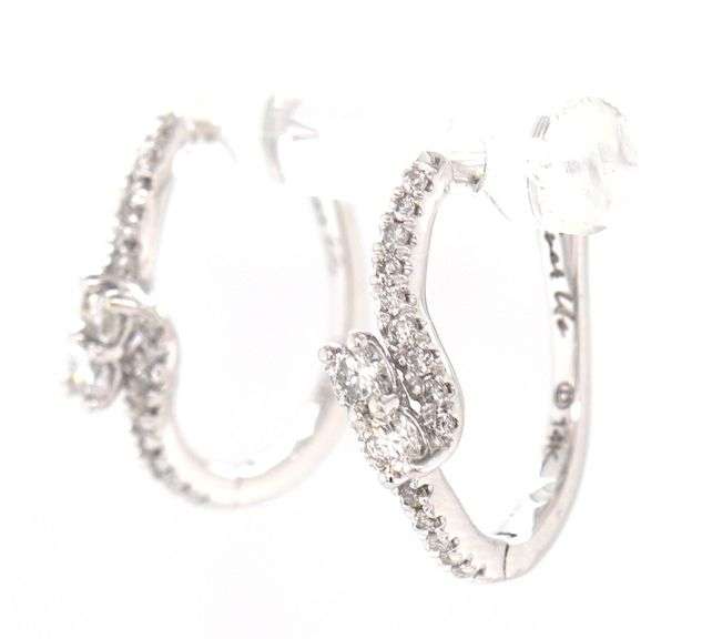 14kt White gold ever us 0.50ctw 2 Stone bypass hoop earrings