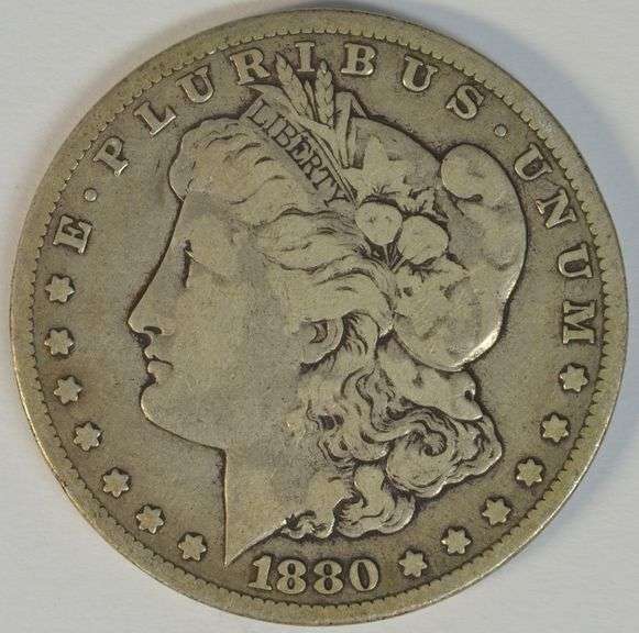 Rare key date 1880-CC Morgan Silver Dollar. Nice circ