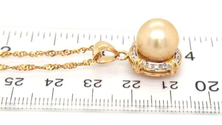 14kt Yellow gold 11-12mm Golden south sea pearl and diamond accent pendant on rope chain