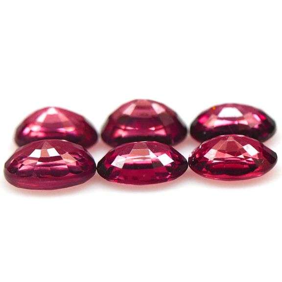 Remarkable 6.06ct violet pink Rhodolite Garnet set