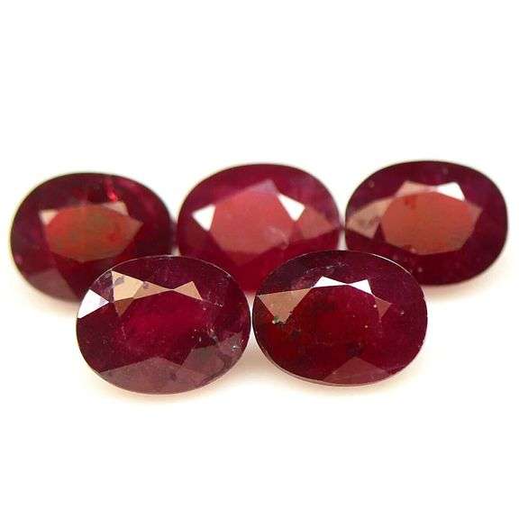 Heavy 14.63ct oval cut Ruby set