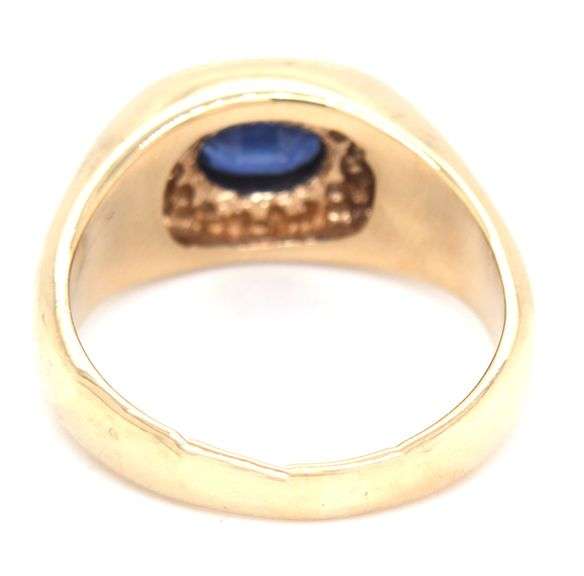Gent's 14kt Yellow gold blue sapphire and diamond halo ring