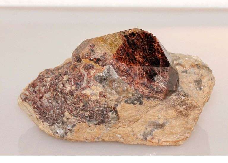 Huge Garnet Dodecahedron with Garnet Spray