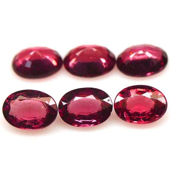 Remarkable 6.06ct violet pink Rhodolite Garnet set