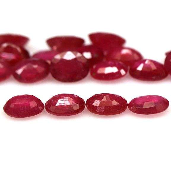 Rich 7.54ct oval cut imperial red Ruby set