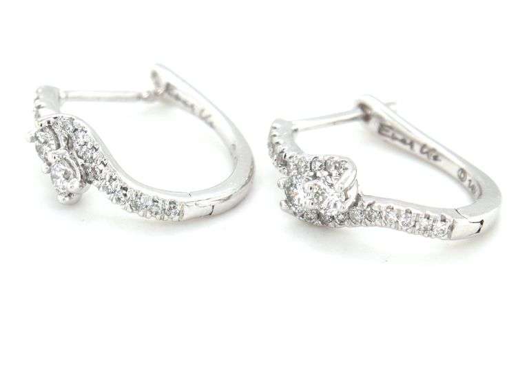 14kt White gold ever us 0.50ctw 2 Stone bypass hoop earrings