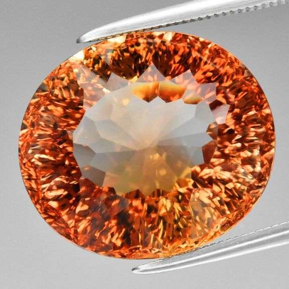 Fiery flashing 17.90ct amber Imperial Topaz