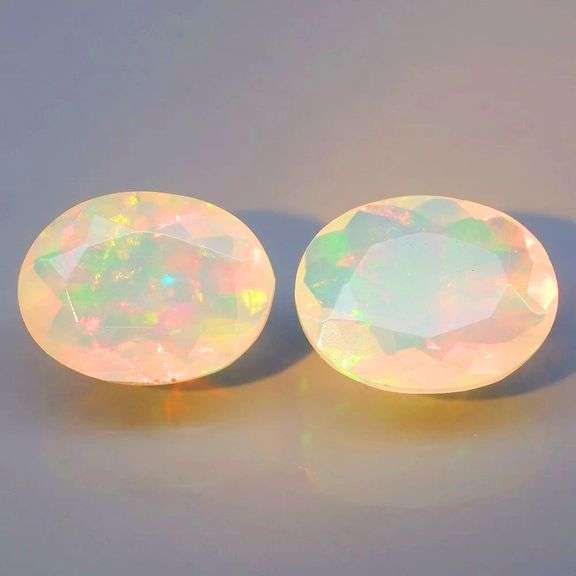 Marvelous pair of faceted opals weighing 2.34 carats!