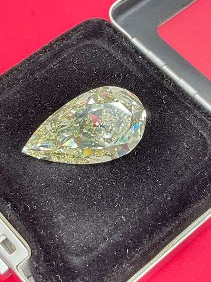INVESTMENT QUALITY 18.88 CARAT G.I.A CERTIFIED FANCY LIGHT YELLOW PEAR SHAPE DIAMOND