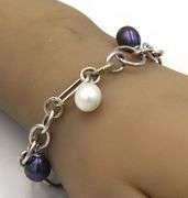 18kt White gold black and white pearl charm bracelet